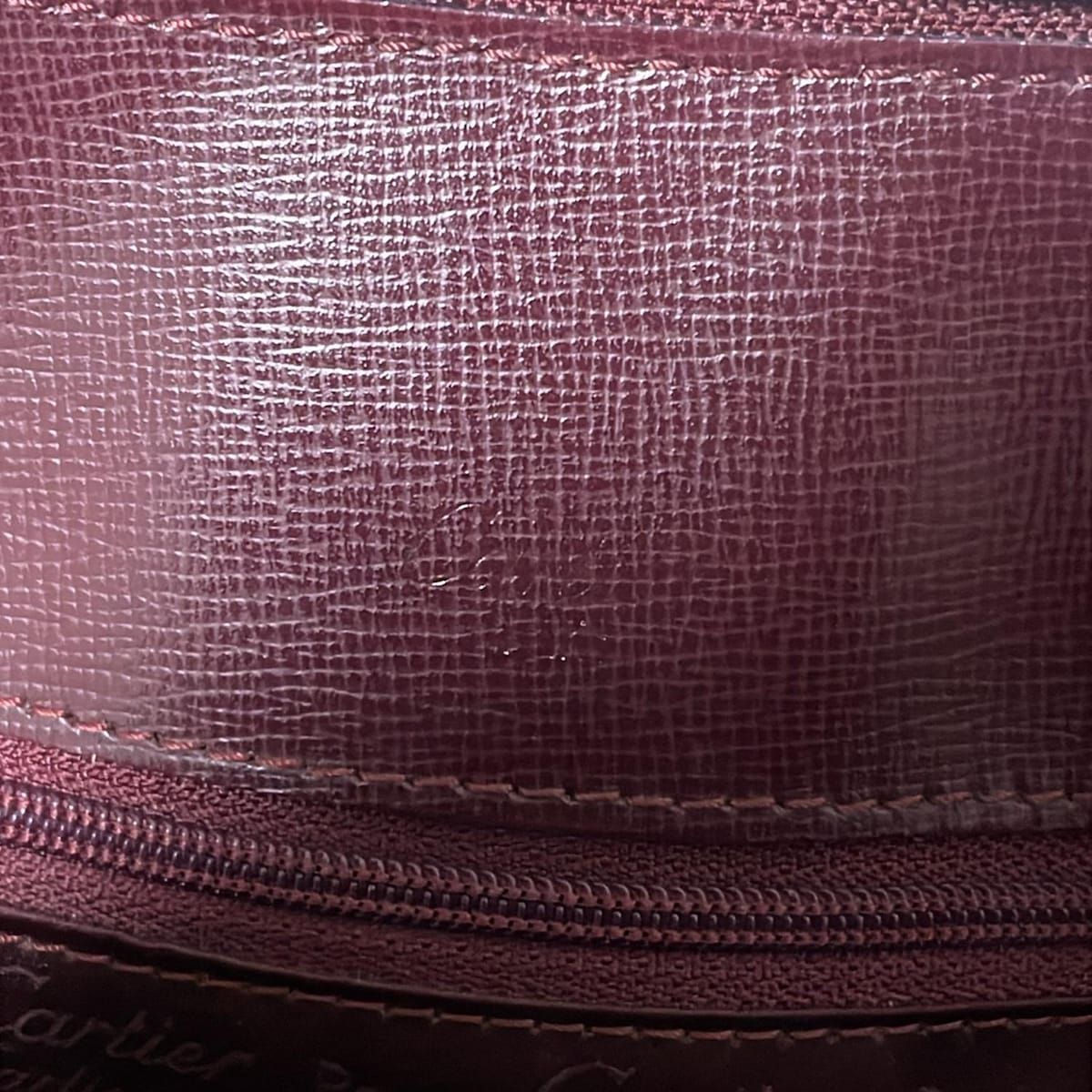 Cartier(カルティエ) リュックサック - ボルドー レザー - メルカリ