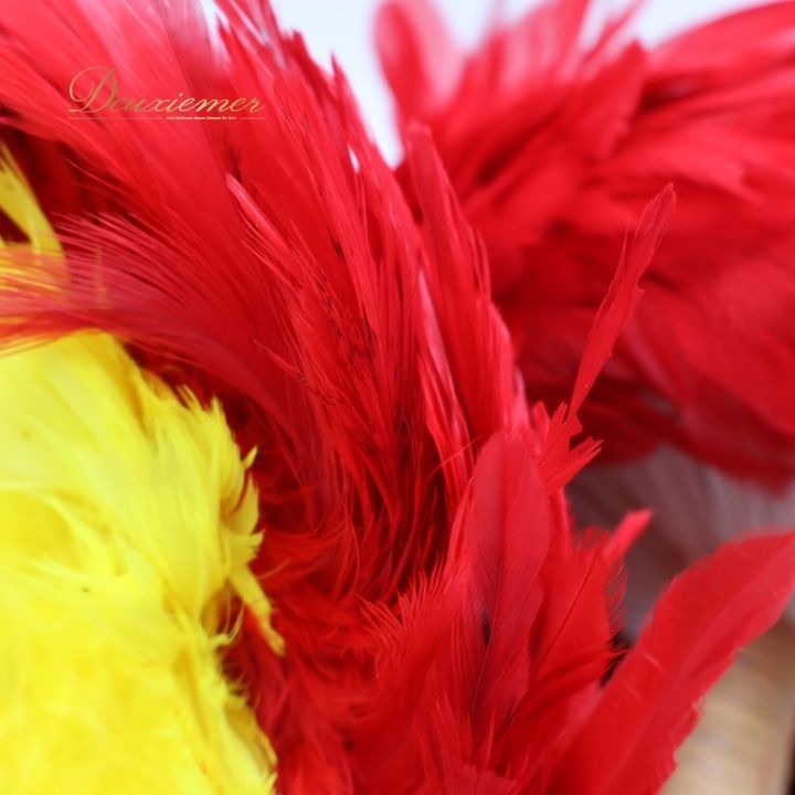 フラダンスウリウリ 赤と黄色の羽根1点 フラダンス ウリウリ 一体型 羽毛 赤 中心部 黄色 楽器 ハワイ Hawaii