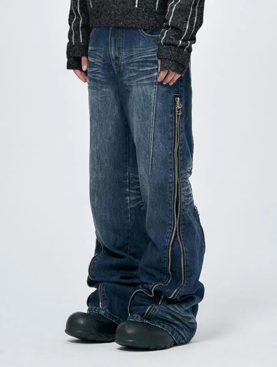 スキーイズムINデュージング CONVERTIBLE ZIP UP JEANS BLUE