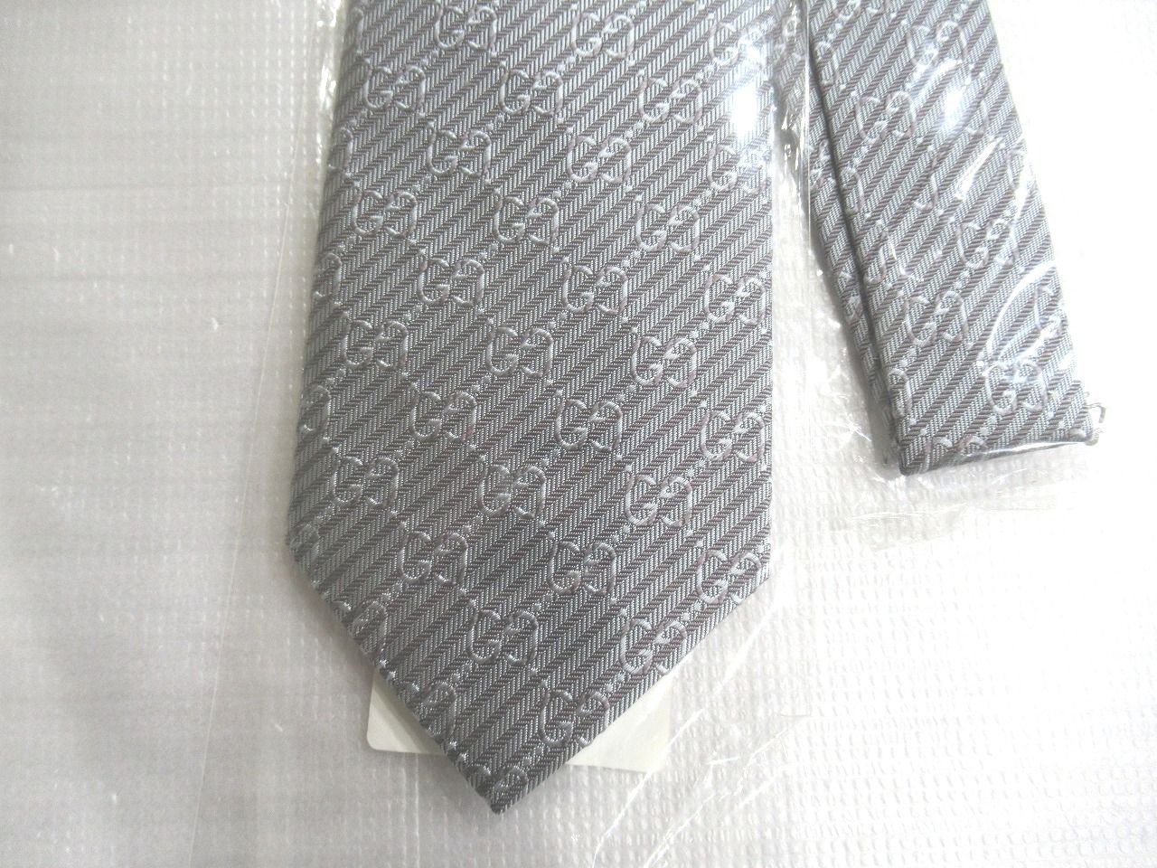 GUCCI ネクタイ 剣先約８㎝ シルク１００％ グレー～シルバー系 インターロッキングG GGマーク