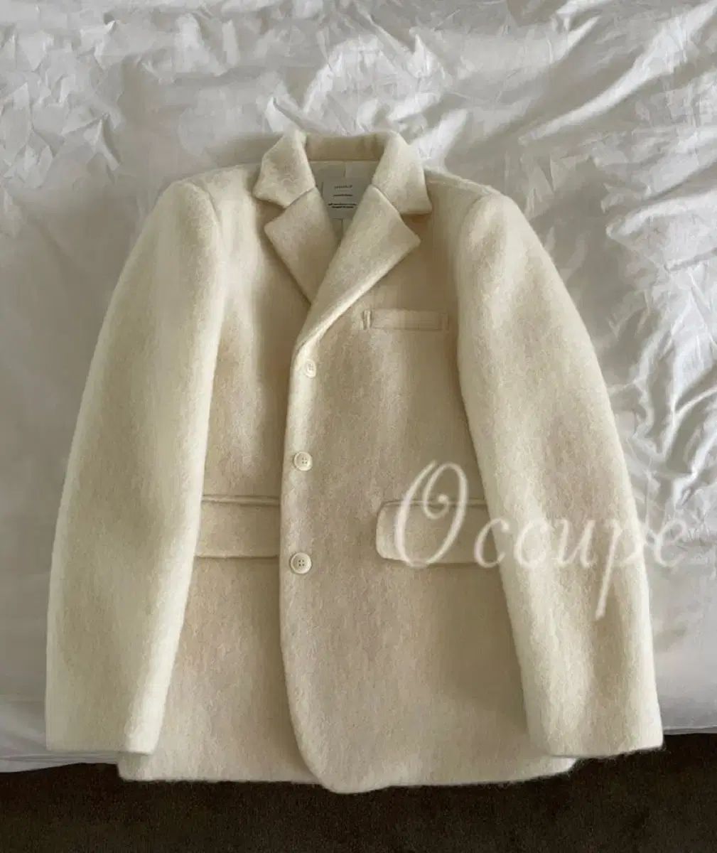 オキューペ ドメタグ イナフ ヘアリー アルパカ ジャケット アイボリー チャコール