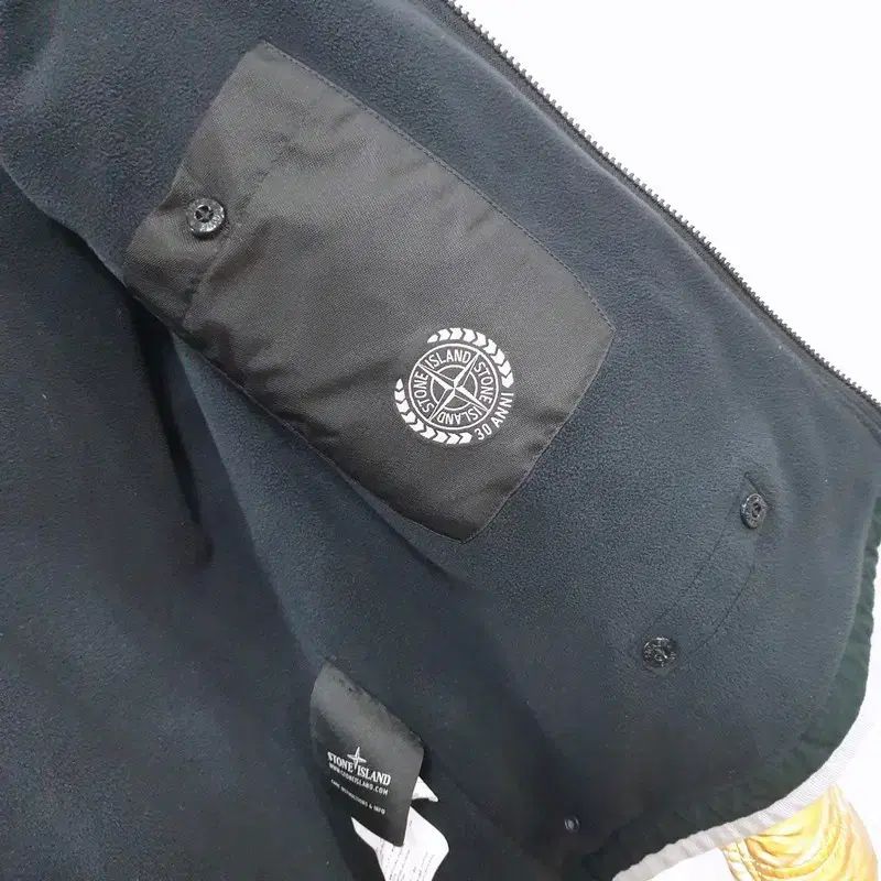 ストーンアイランド リキッド リフレクティブ ジャケット - メルカリ