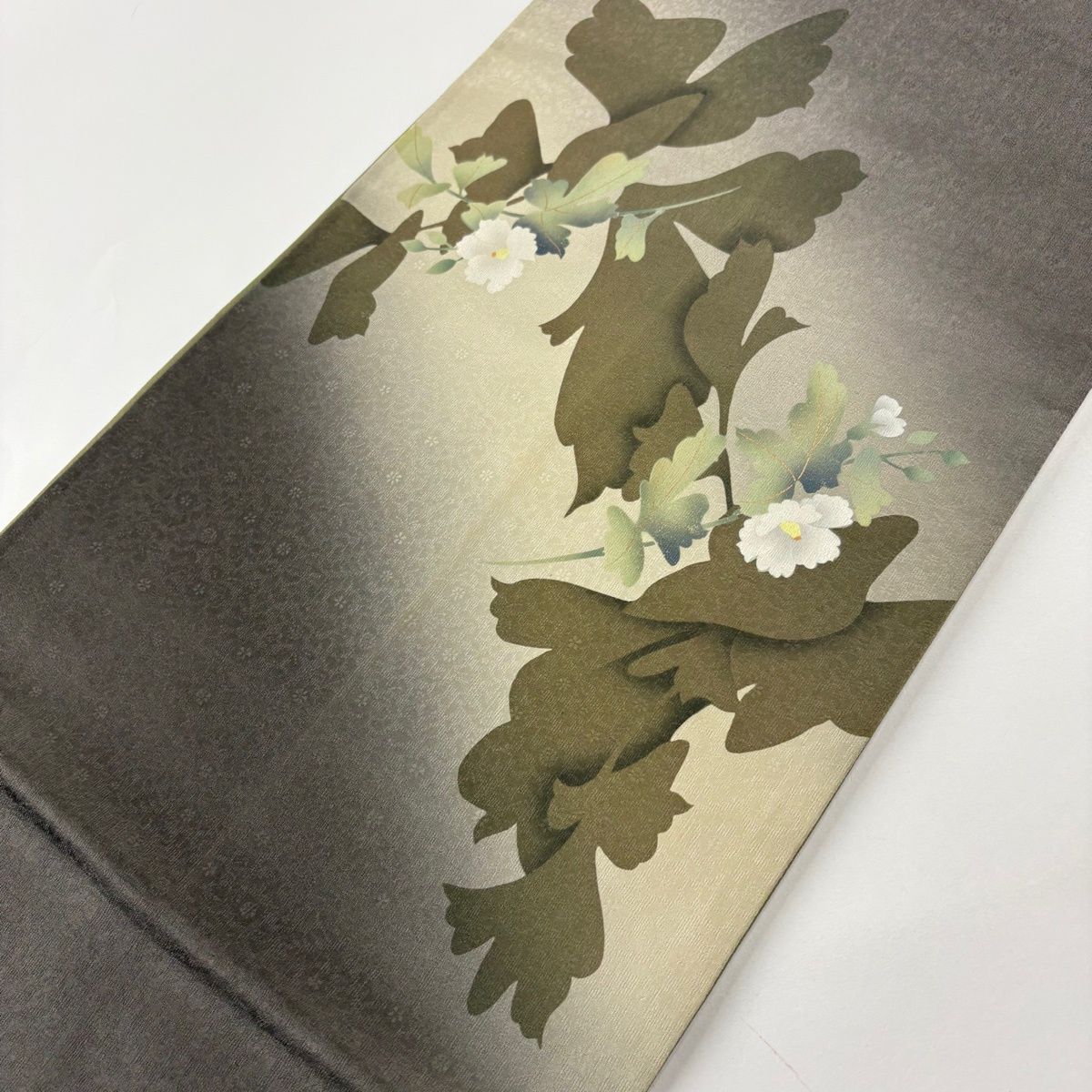 袋帯 秀品 丹下雄介 落款 やまと 草花 金彩 ぼかし 茶緑色 お太鼓柄