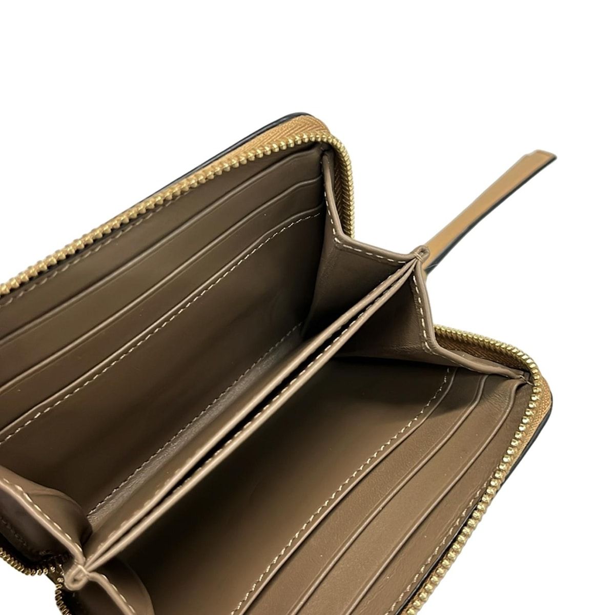 ラウンドファスナー レザー