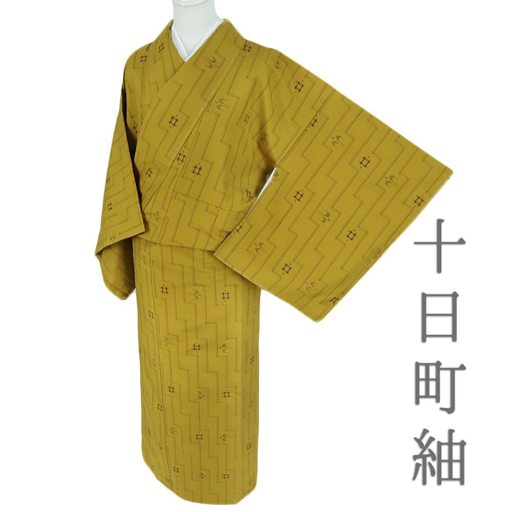 紬 着物 中古 正絹 黄色 琉球絣 燕 十日町紬 身丈161cm 裄66cm Mサイズ