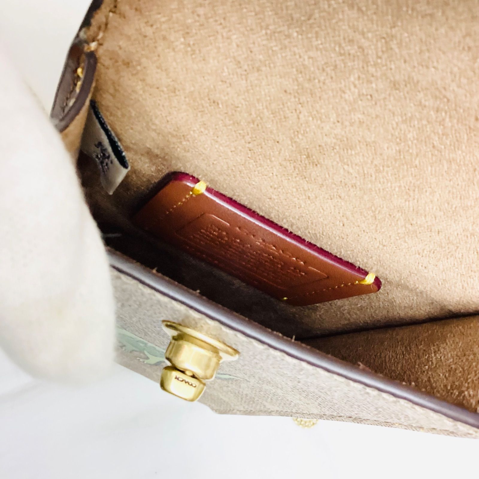  COACH コーチ ターンロック フォーン クロスボディ シグネチャーキャンバス レキシ― プリント 恐竜 ティラノサウルス BROWN フォンバッグ ミニバッグ チェーンバッグ 品 定価44 000円 スマホショルダーバッグ ショルダーバッグ