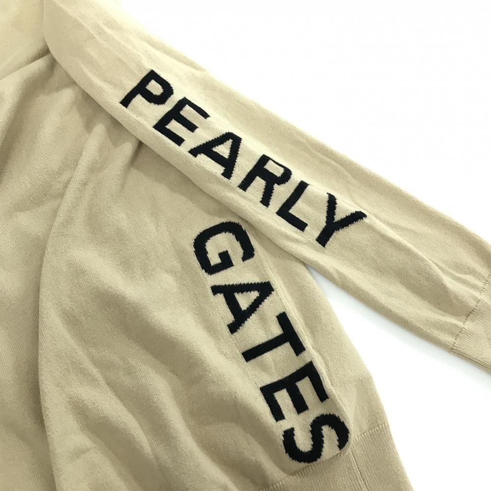 パーリーゲイツ タートルネックセーター ベージュ×黒 袖ロゴ ニット