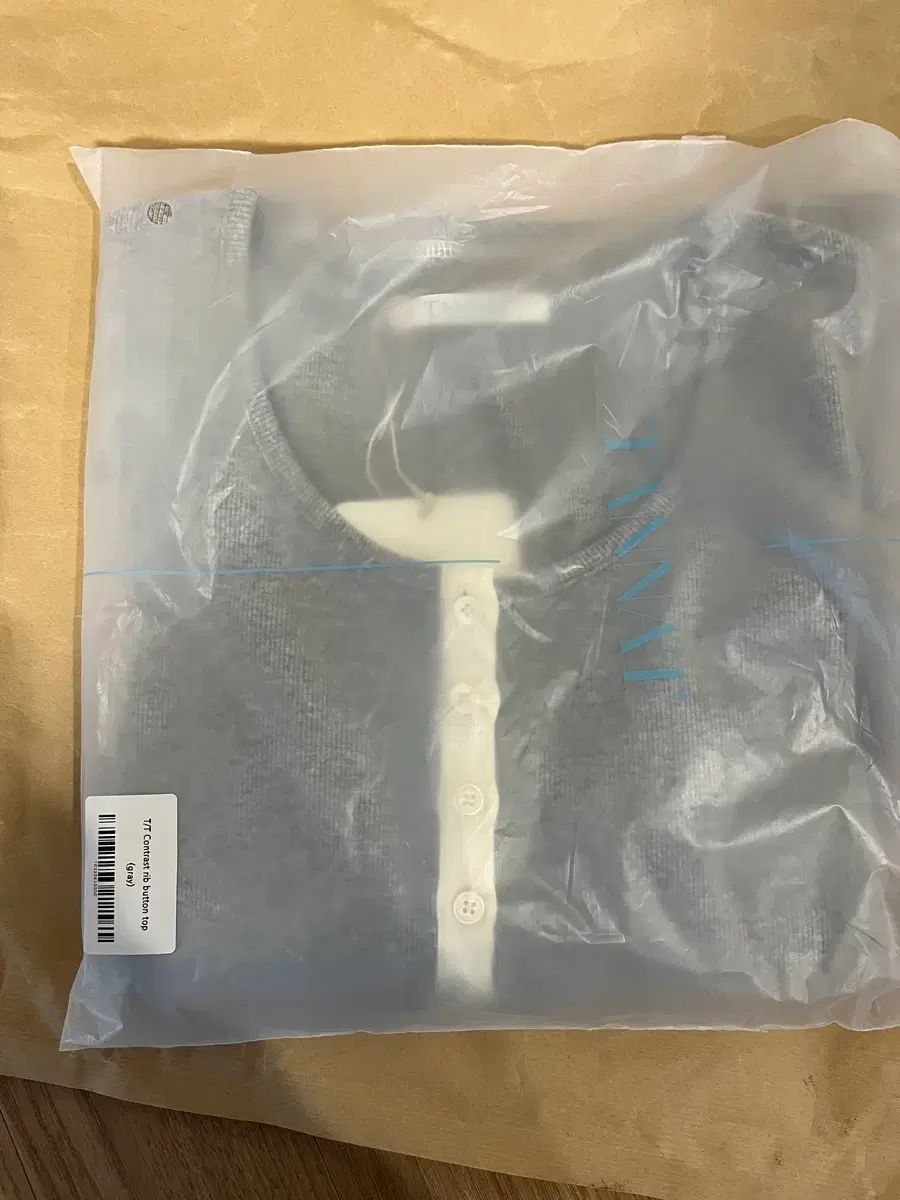 タナット Contrast rib button top gray