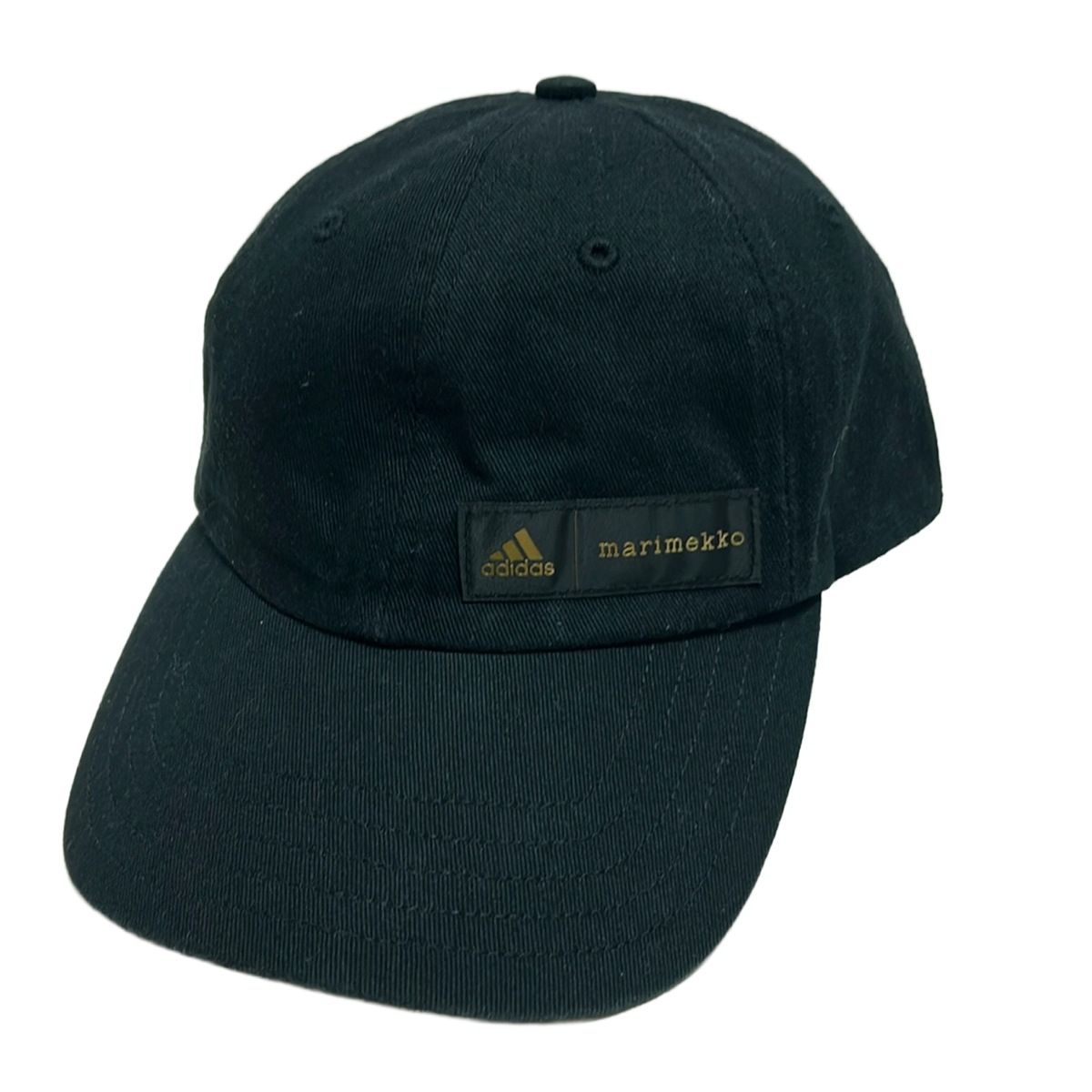 marimekko マリメッコ キャップ - 黒×ゴールド adidasコラボ ウニッコ コットン