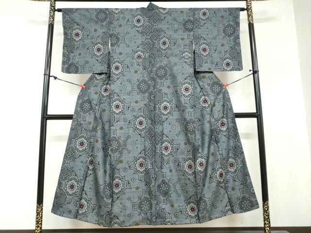 平和屋着物 本場大島紬 割り込み絣 草花文 正絹 ud