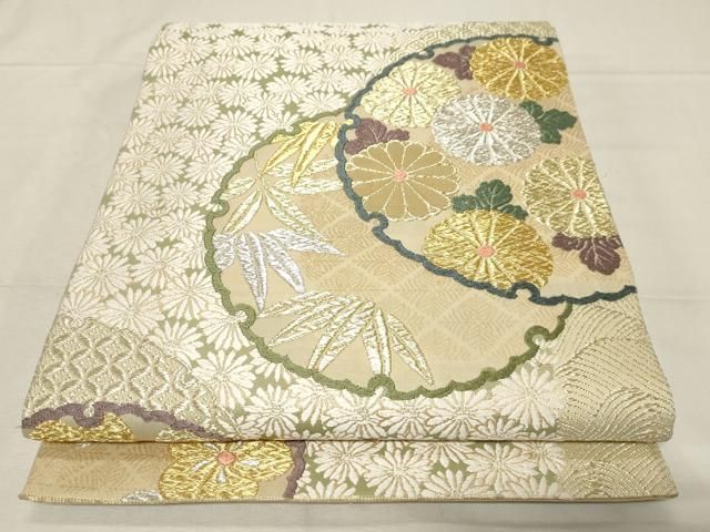 平和屋着物○六通柄袋帯 唐織 緑茶染 雪輪笹梅花文 金銀糸 正絹 逸品