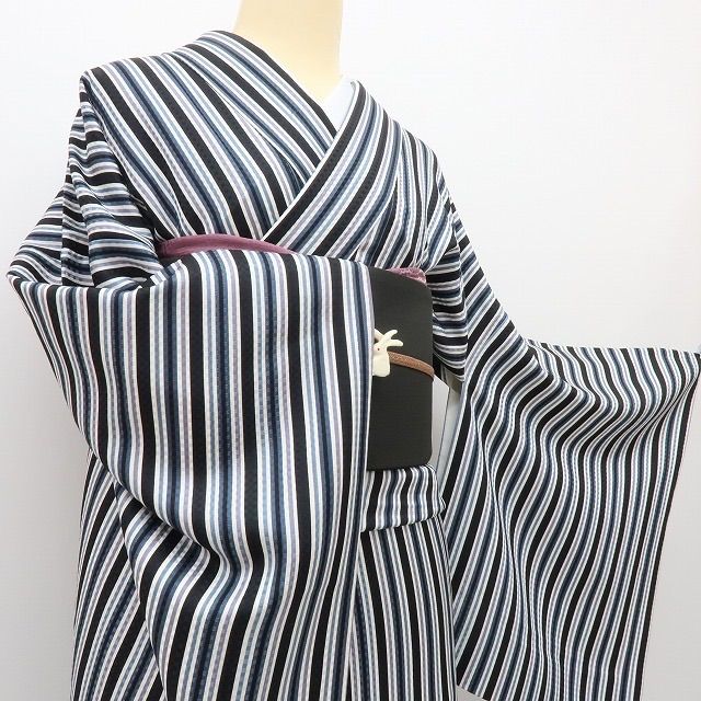 縦縞に市松の隠し味