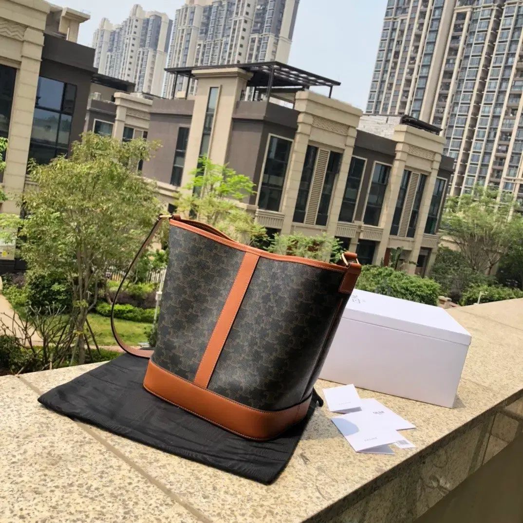 トリ アン プロ ロゴ キャンバス バケット バッグ