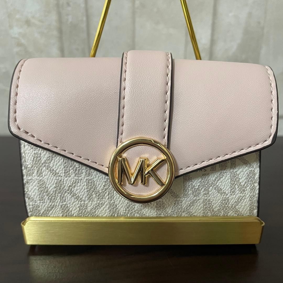 MICHAEL KORS 三つ折り財布 シグネチャー柄