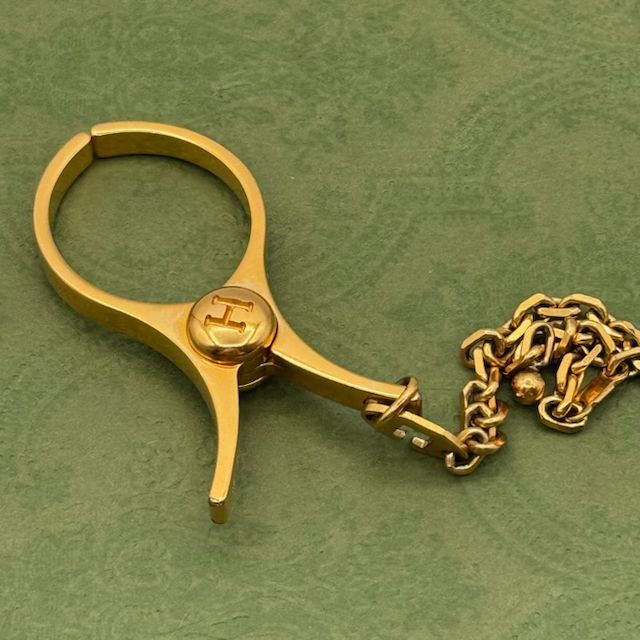 HERMES フィルー 手袋 グローブホルダー ゴールド 125372 - メルカリ