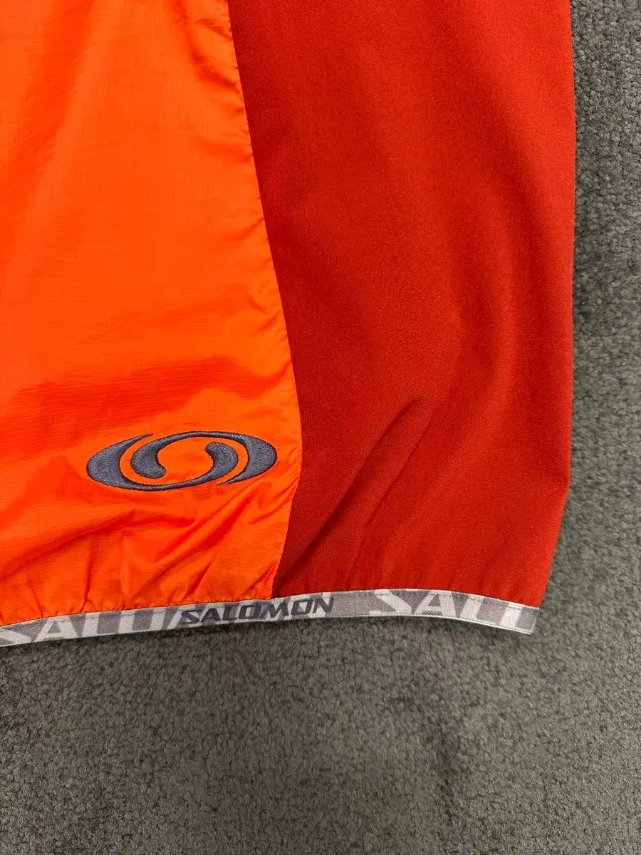 Salomon オレンジ ウィンドブレーカー ジャケット XL - メルカリ