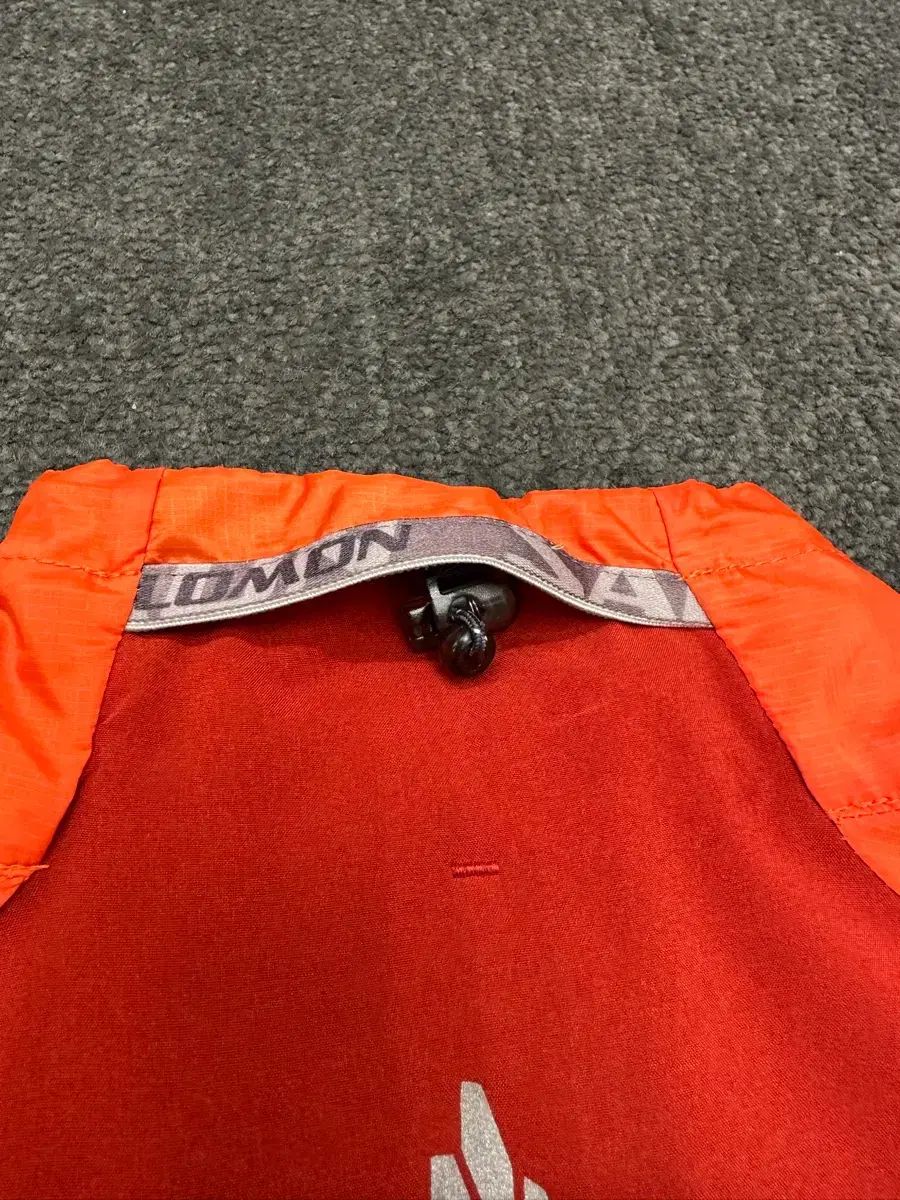 Salomon オレンジ ウィンドブレーカー ジャケット XL - メルカリ