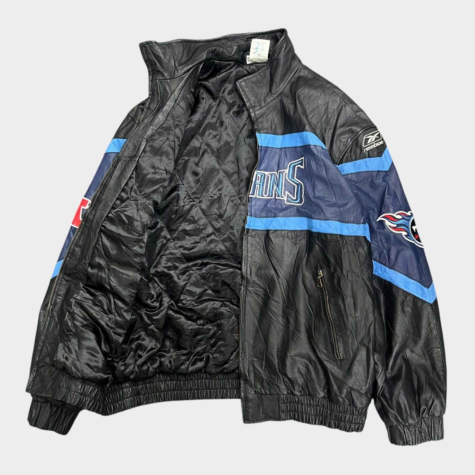 リーボック 古着 レザージャケット スタジャン REEBOK Titans