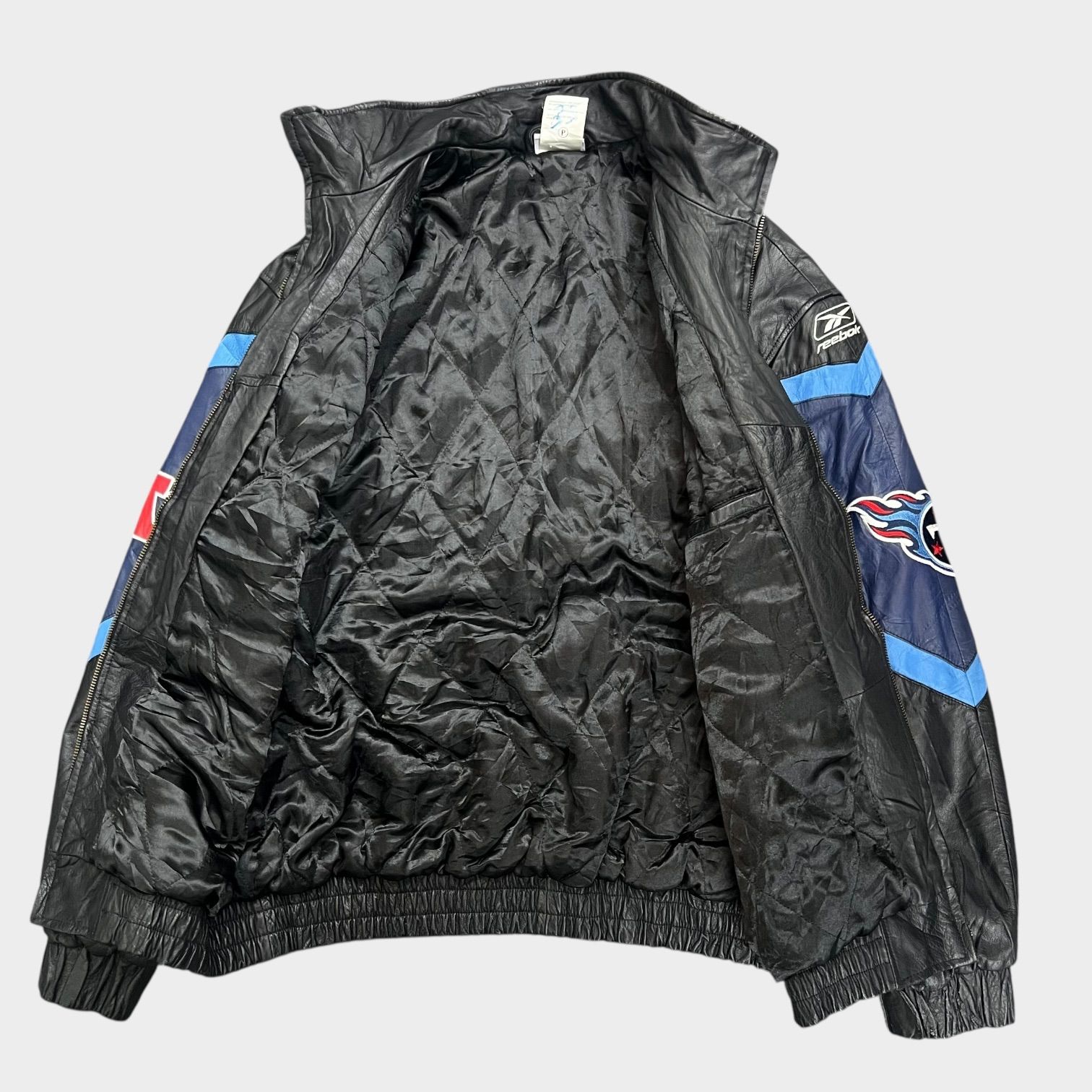 リーボック 古着 レザージャケット スタジャン REEBOK Titans