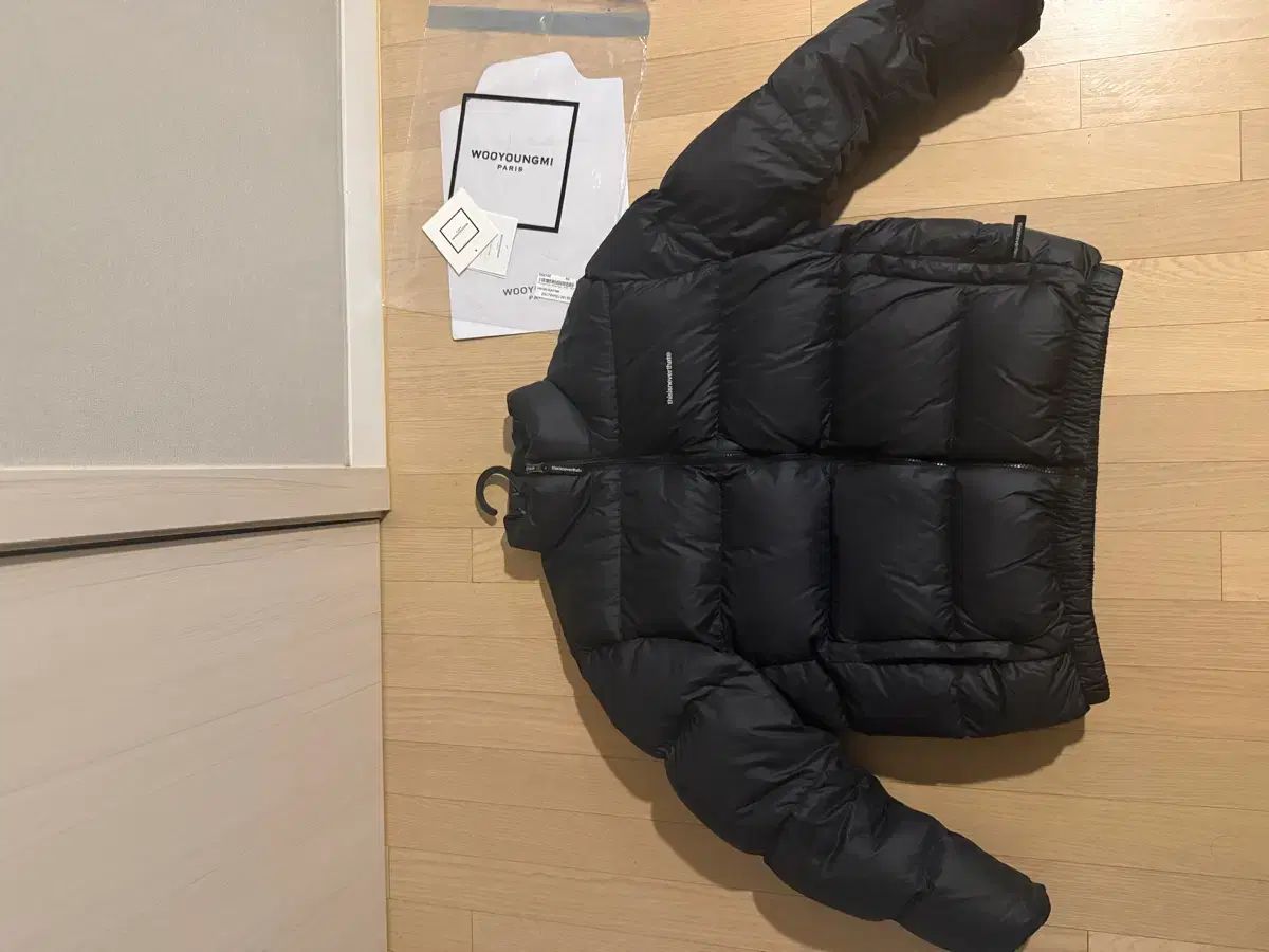 セール中 thisisneverthat(ディスイズネバーザット) ダウン