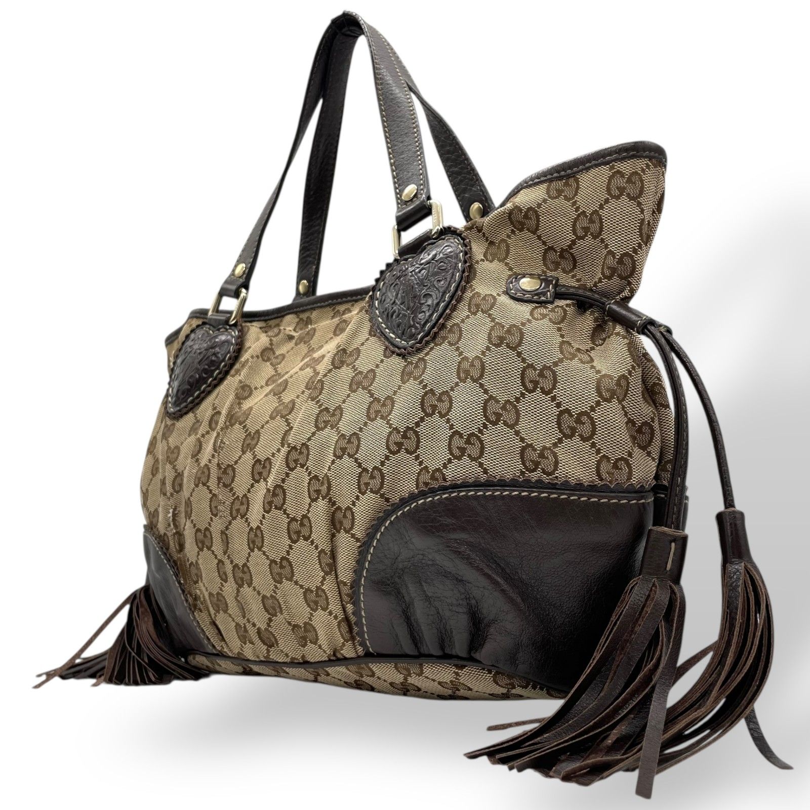 GUCCI】ハンドバッグGGキャンバスタッセルブラウン 【公式通販】