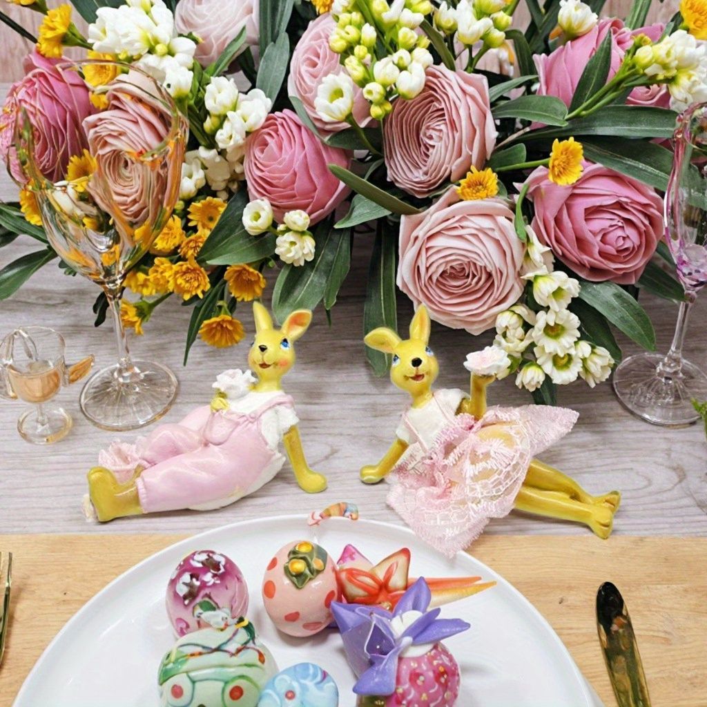 置物 オブジェ ガーデンオーナメント ピンクの洋服を着ているウサギ