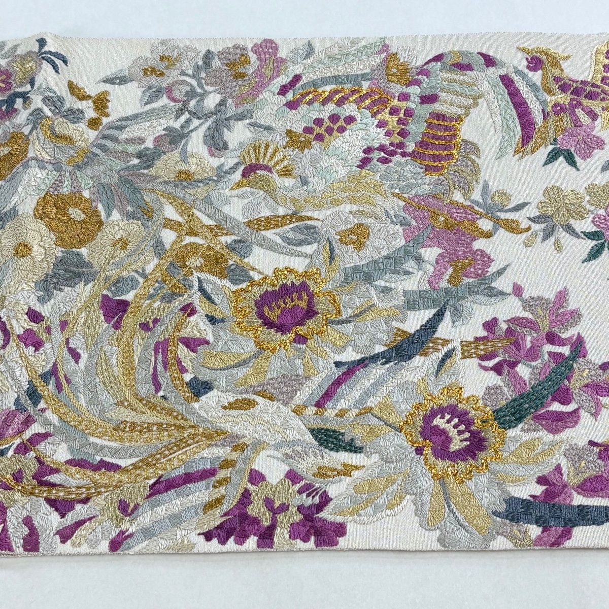 袋帯 逸品 じゅらく 落款 帝王紫 鳳凰 草花 刺繍 金銀糸 クリーム