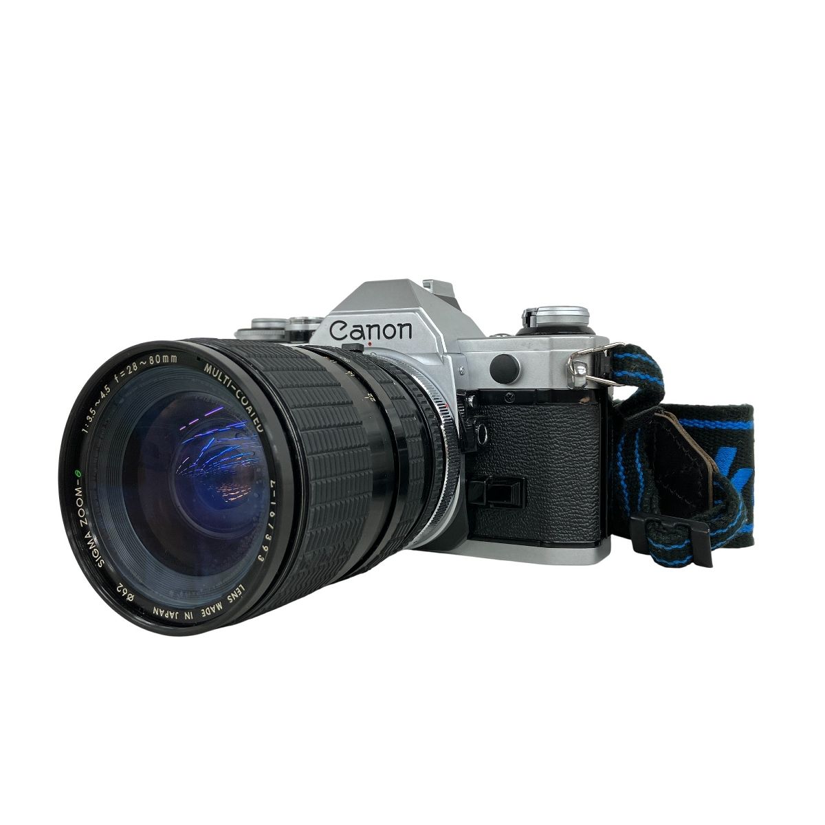 CanonAE-1フィルムカメラ28mmレンズ付きジャンク本体の CANON AE-1 SIGMA ZOOM 3.5-4.5 f=28-80mm フィルムカメラ ジャンク