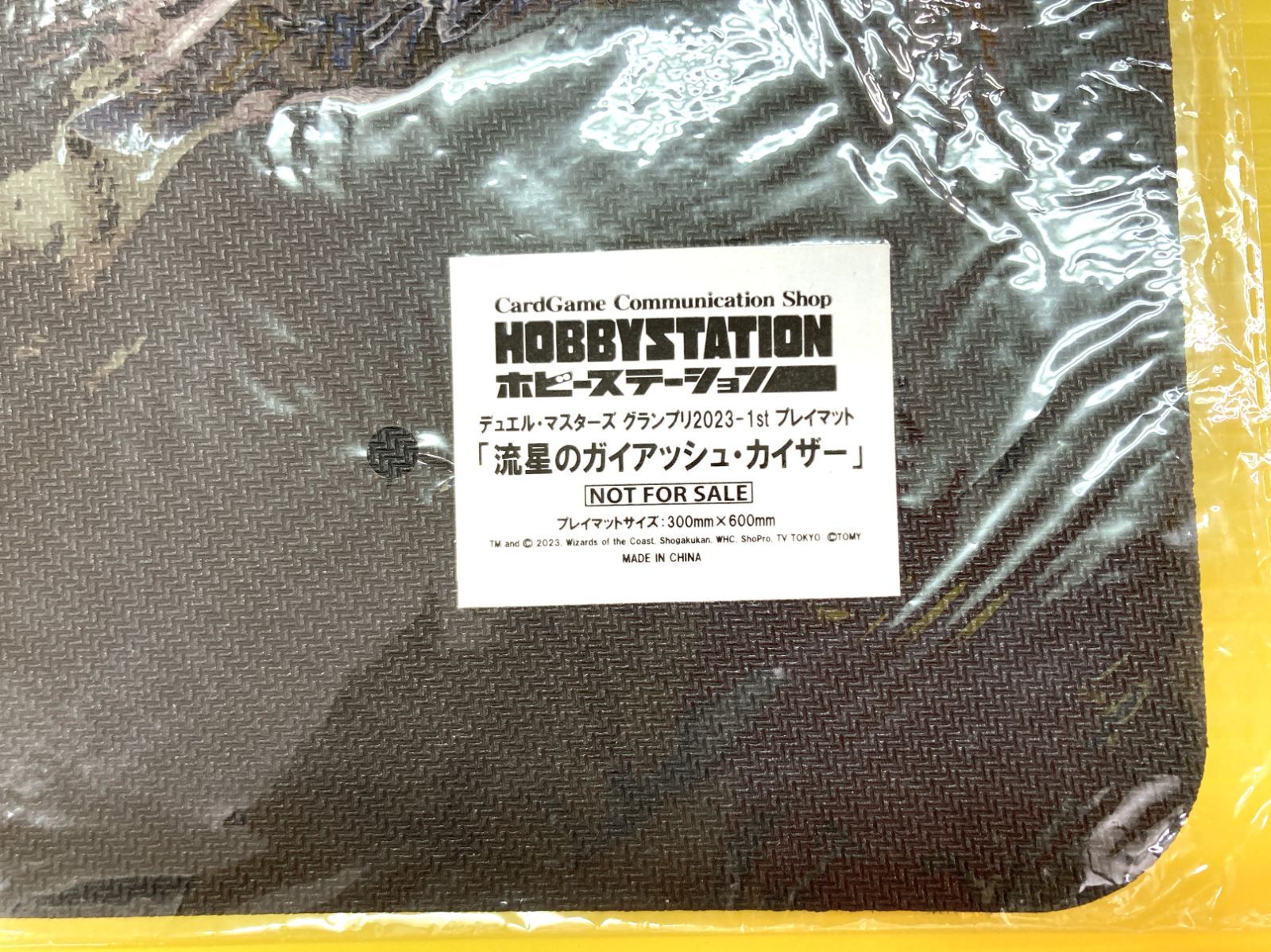 新品】 GP2023 1st 流星のガイアッシュ・カイザー プレイマット - メルカリ