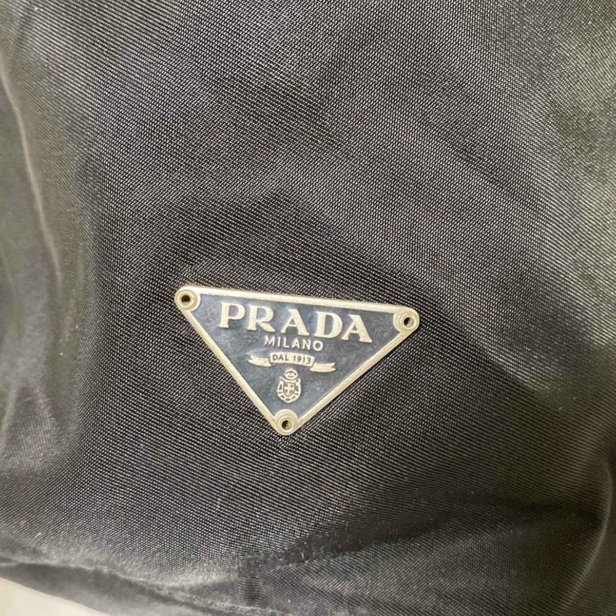 PRADA(プラダ) ポーチ - 黒 巾着型 - メルカリ