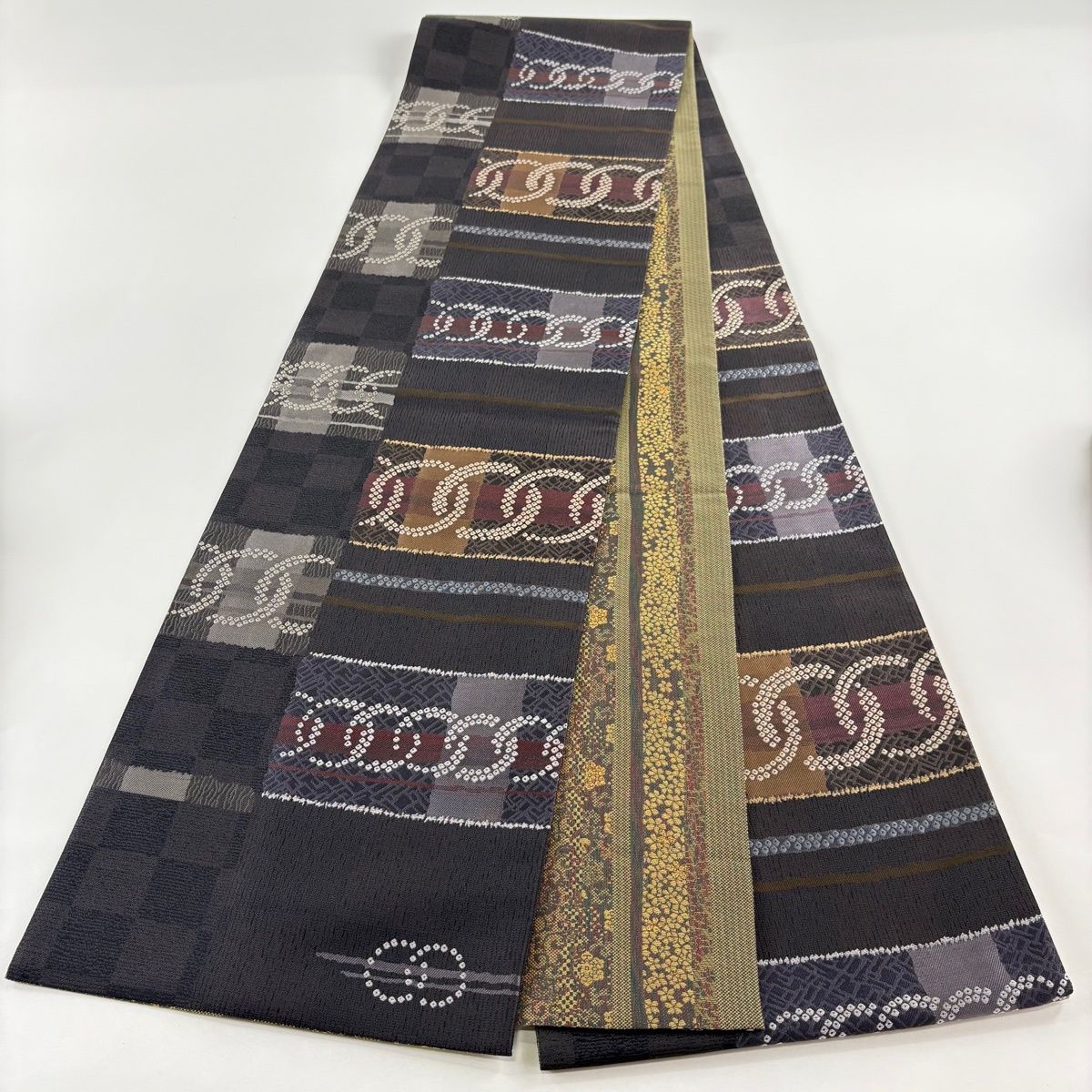 美品】 袋帯 逸品 とみや織物 落款 リバーシブル 輪つなぎ 花唐草 金糸