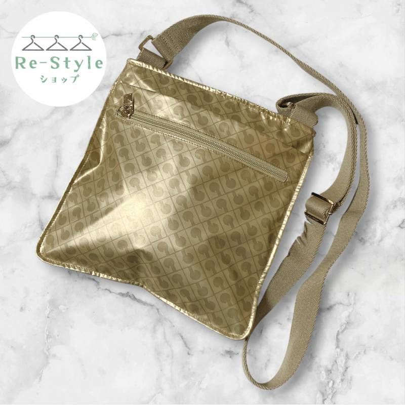 アラン　ショルダーゴールドグリッター　中古 LeSportsac（レスポートサック）の「DANIELLA CROSSBODY シャンパン