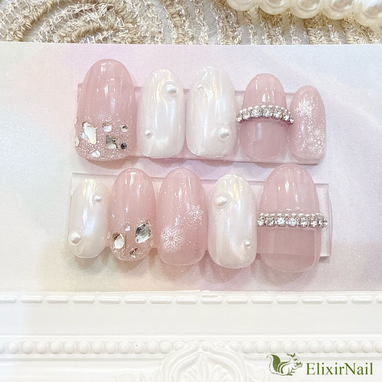 現品】ネイルチップ 白 ピンク 雪の結晶 ワンホン - メルカリ
