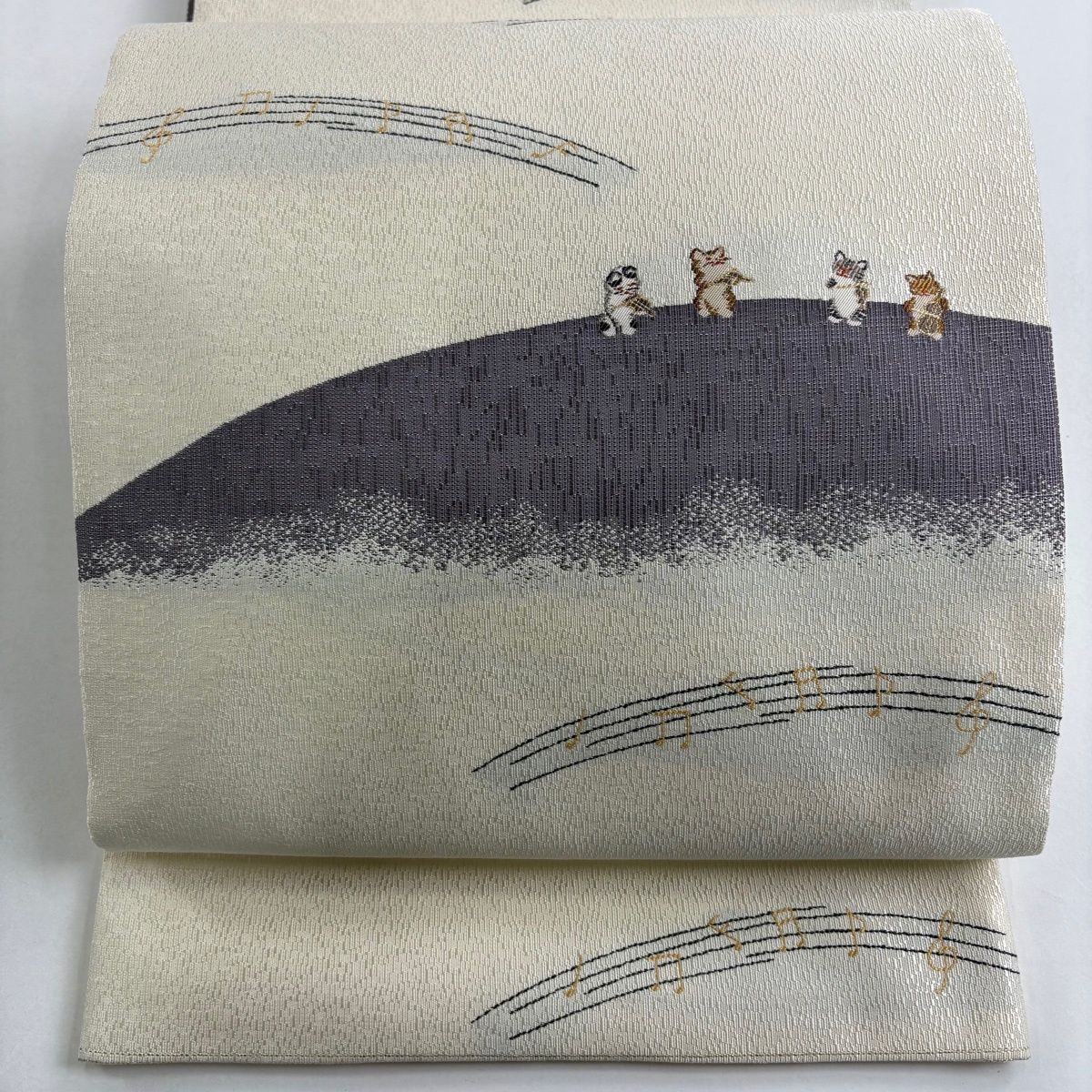 美品】 袋帯 逸品 猫の合奏 音符 金糸 灰白 お太鼓柄 正絹 【中古