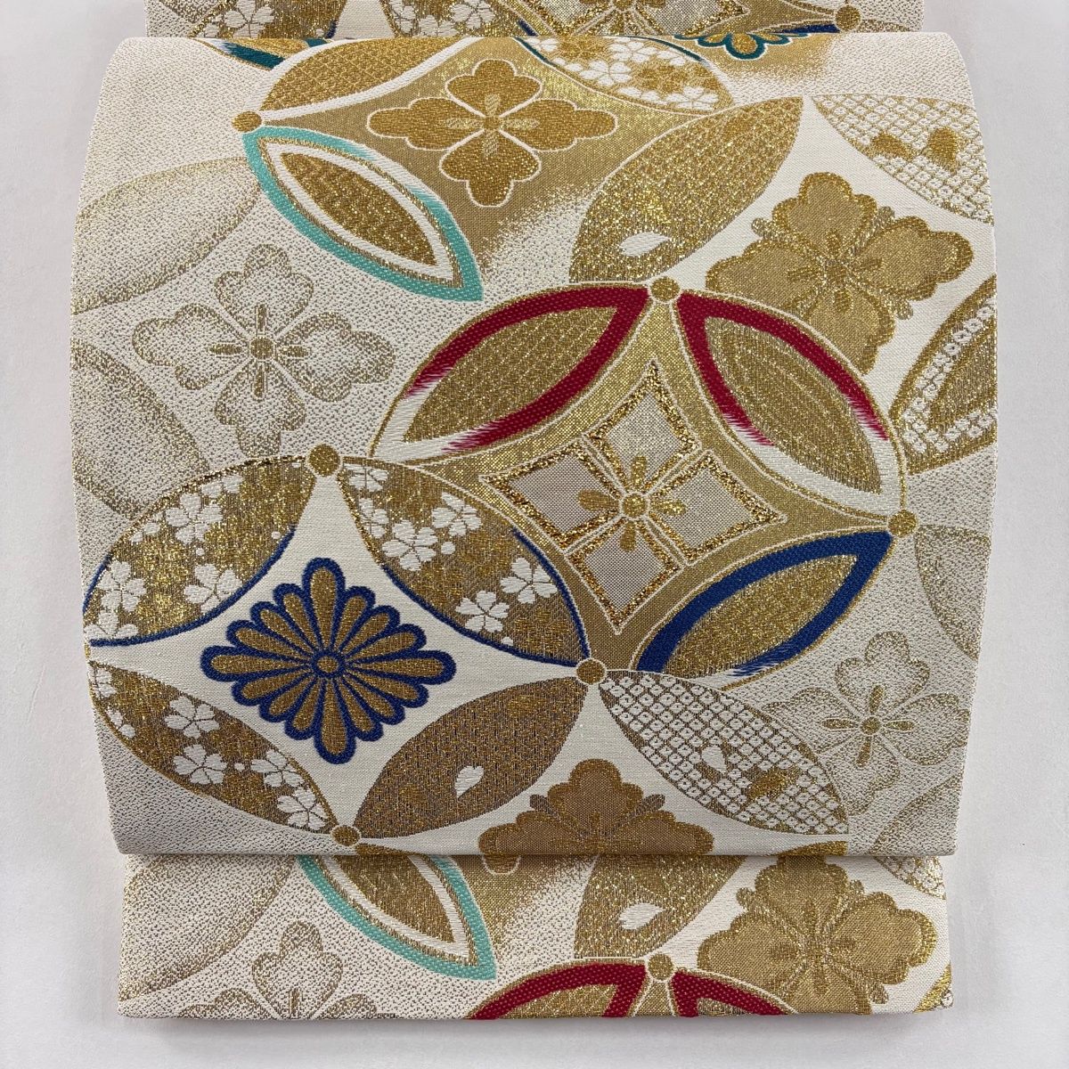 美品】 袋帯 秀品 振袖向き 七宝 花菱 箔 金糸 クリーム 六通 正絹