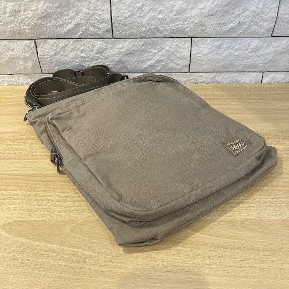 最終値下げです。PORTER ブラウン ショルダーバッグ　新品未使用　保存袋あり PORTER ポーター 吉田カバン ショルダーバッグ 縦型 ブラウン ナイロン