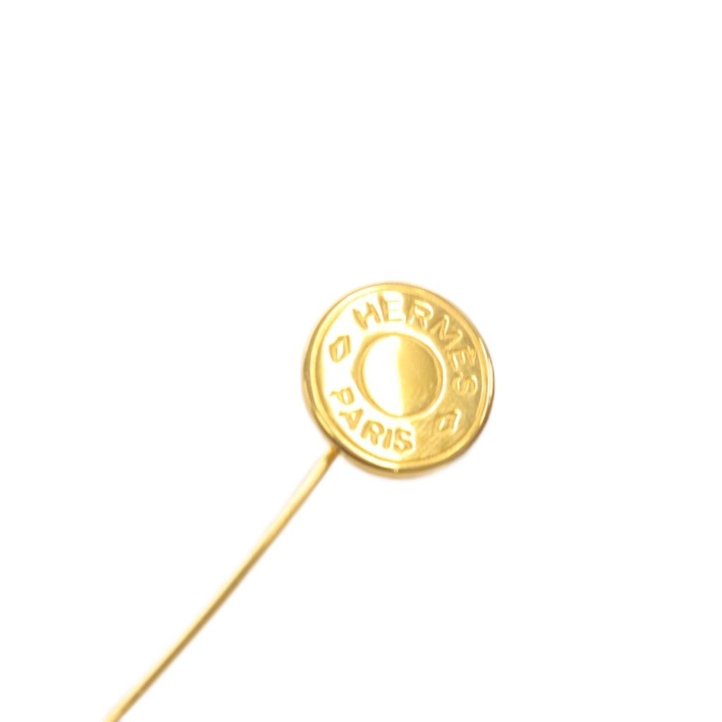 エルメス HERMES セリエ ピンブローチ ロゴ ゴールド色 - メルカリ
