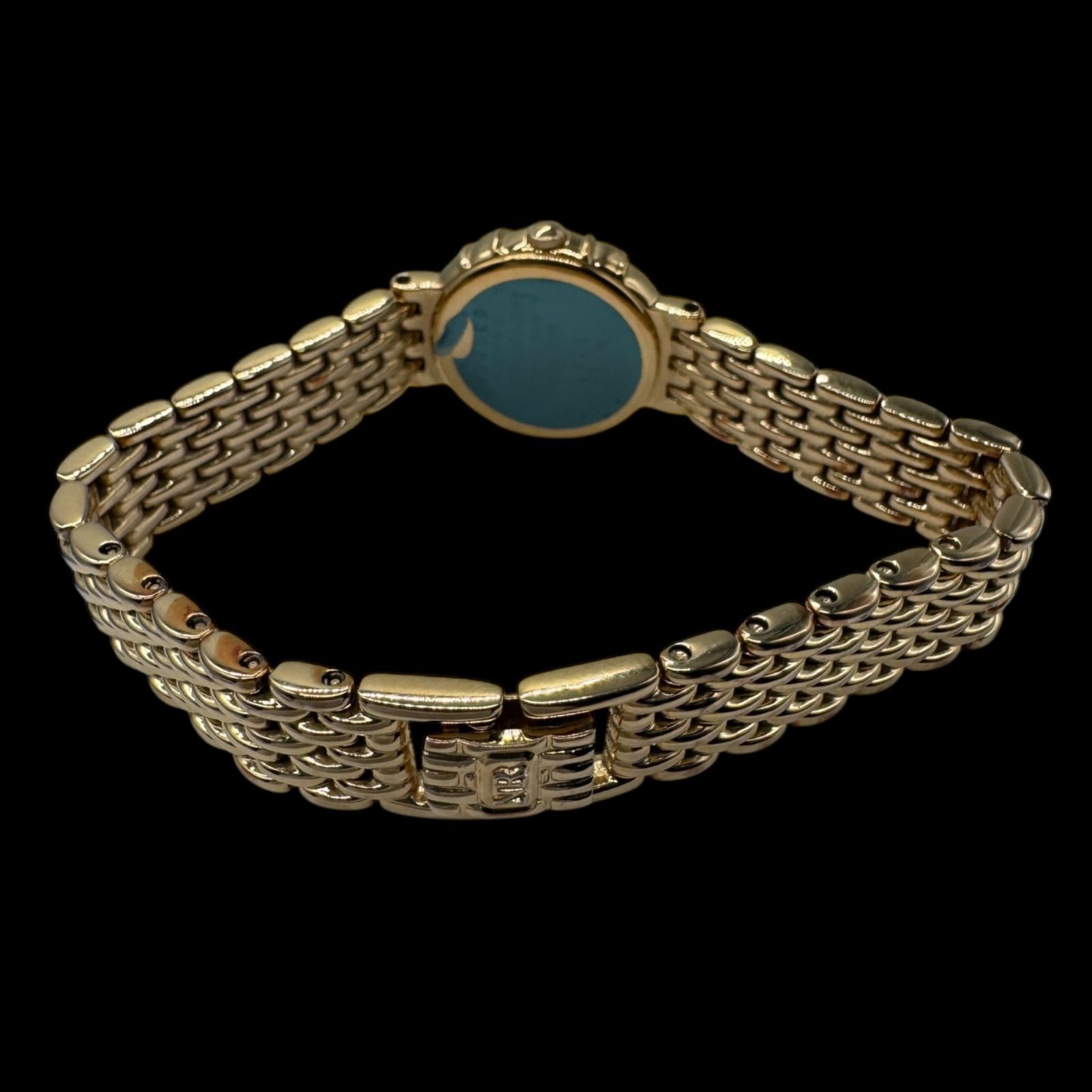 新品電池稼働 良品 NINA RICCI ニナリッチ シェル文字盤 石付き