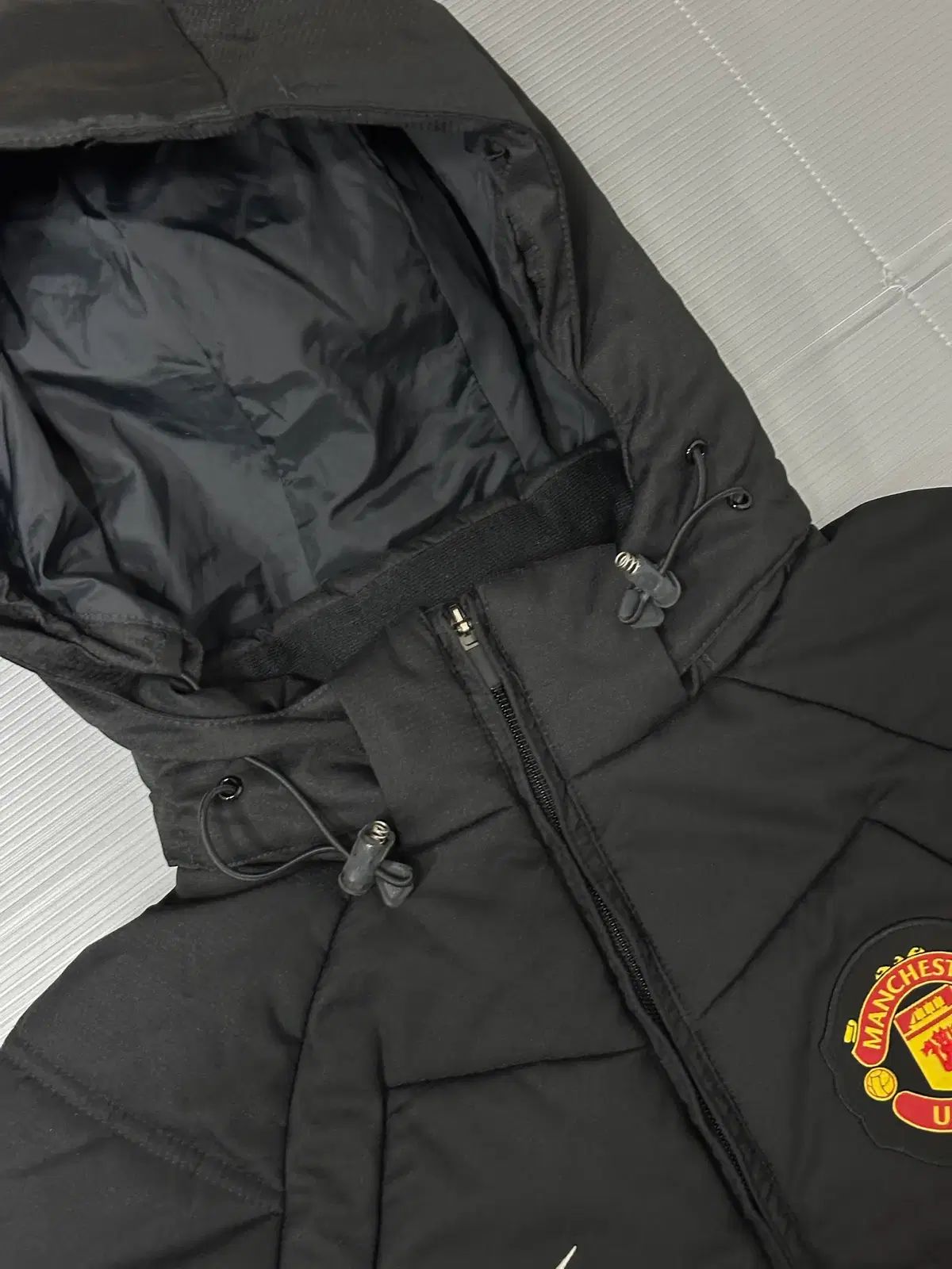 ナイキ マンチェスター・ユナイテッドFC AIG WHO アウター ジャケット