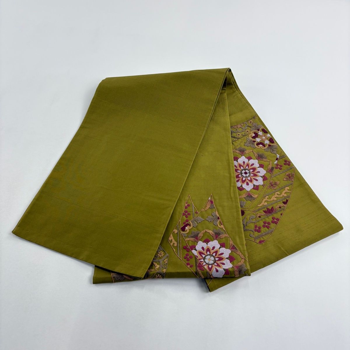 袋帯 秀品 関西仕立て 紬地 華文 花唐草 相良刺繍 鶯色 お太鼓柄 正絹