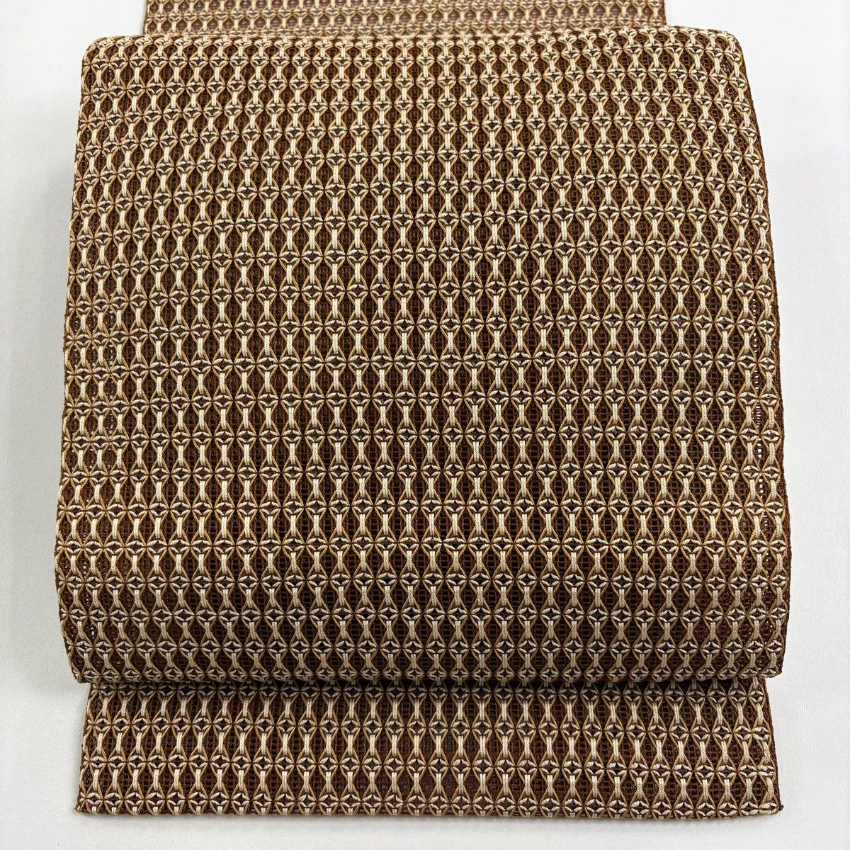 美品】 名古屋帯 秀品 夏帯 八寸名古屋帯 松葉仕立て 幾何学 茶色 正絹