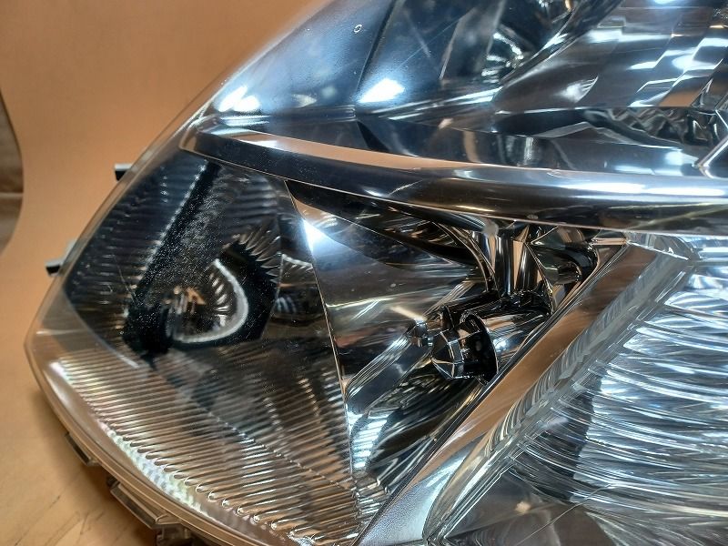 車 コーティング済 アイシス ANM15G 左ヘッドランプ・ヘッドライト L 