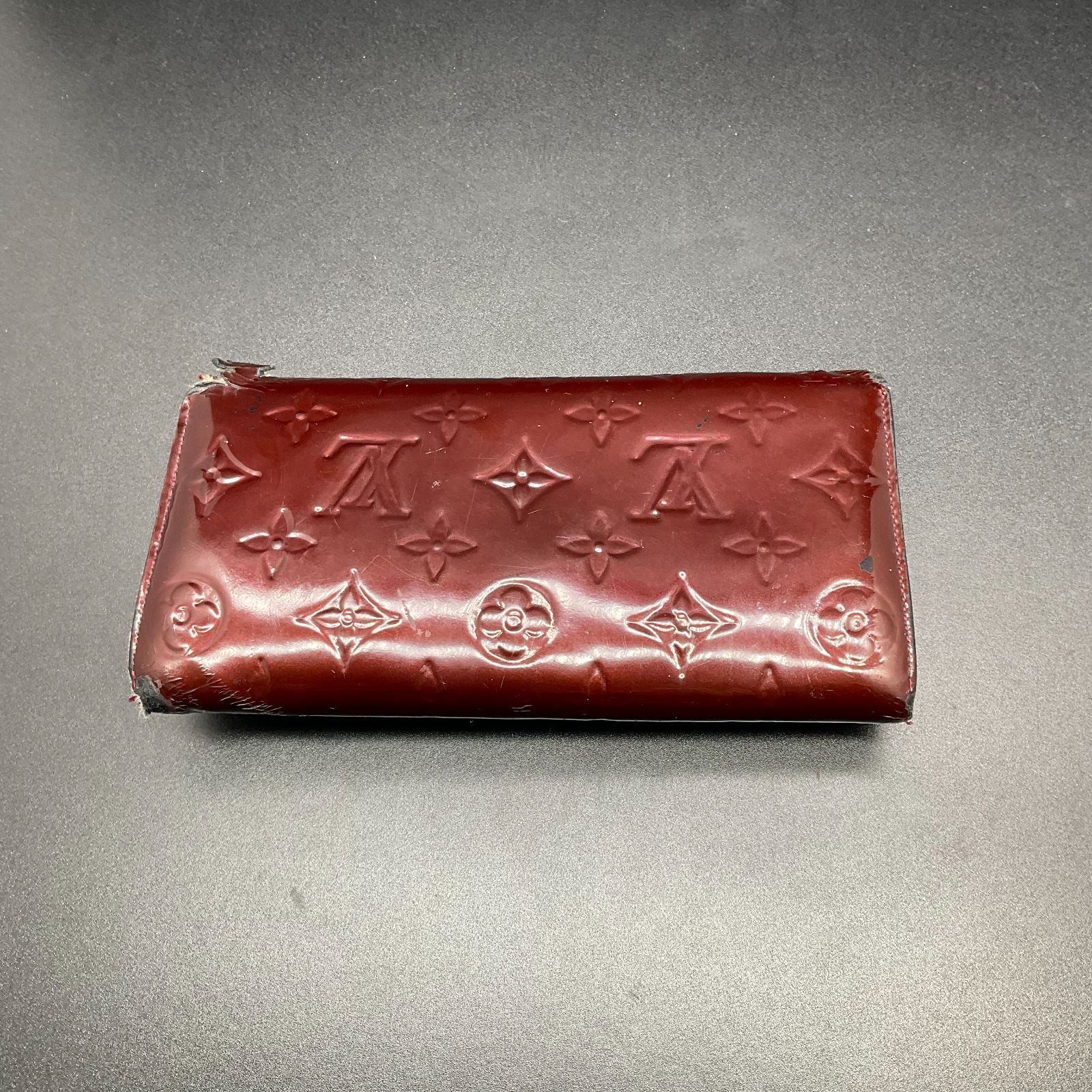 ルイヴィトン M91521 モノグラムヴェルニ ポルトフォイユ サラ ルイヴィトン LOUIS VUITTON M91521 ヴェルニ ポルトフォイユ・サラ 長