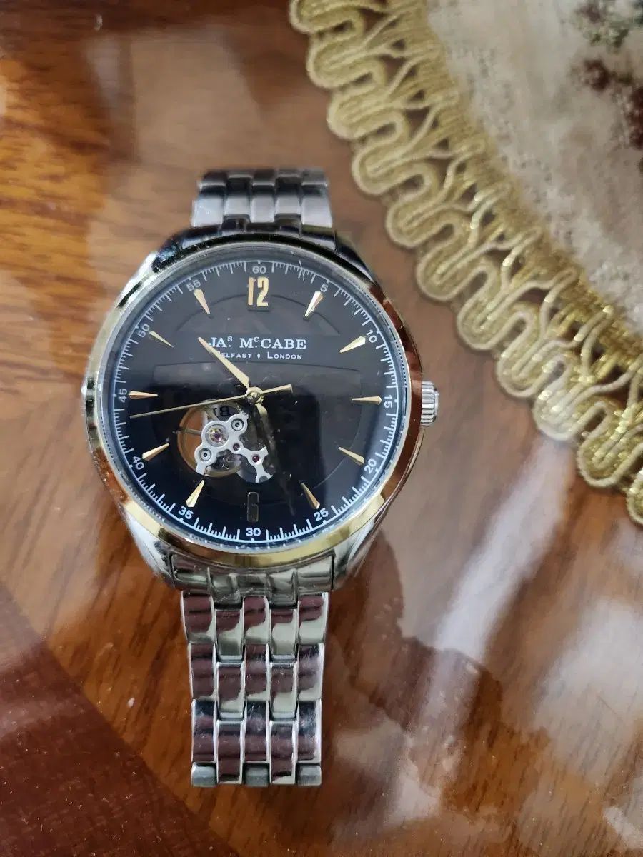 JA McCabe オープンハート(スケルトン) オートマチック時計 金属ベルト