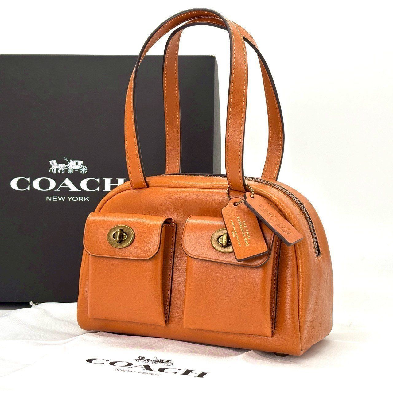 可愛さで満たすご褒美✨ COACH ハンドバッグ ツインターンロックバッグ