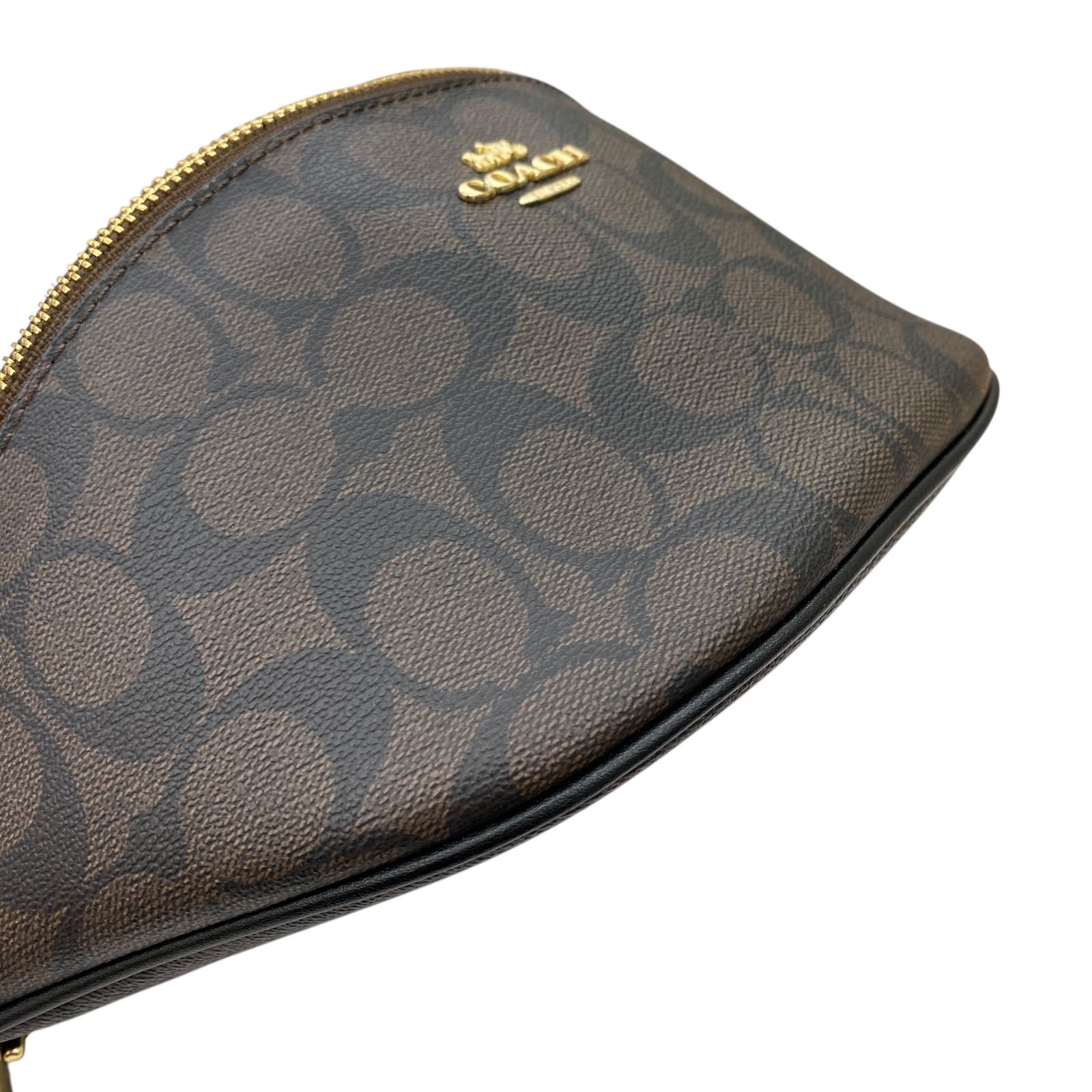 COACH ブラウン モノグラム ボディバッグ COACH（コーチ）の「ゴッサム