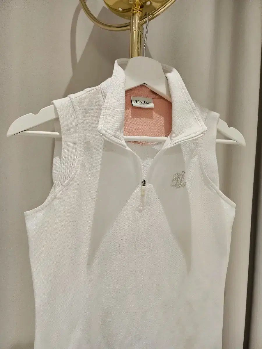 ゴルフ フェアライアー fairliar トップス 半袖 シャツ（XSサイズ） FairLiar(フェアライアー) レディース ゴルフ トップス 白 XS(55