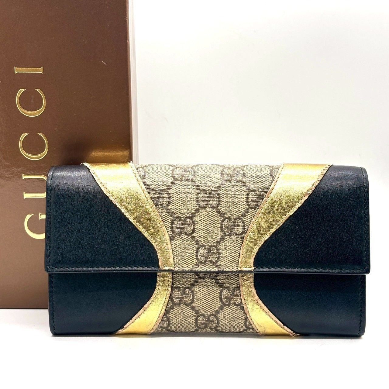 大人の品格を添える✨ GUCCI グッチ 長財布 GGスプリーム フラップ PVC