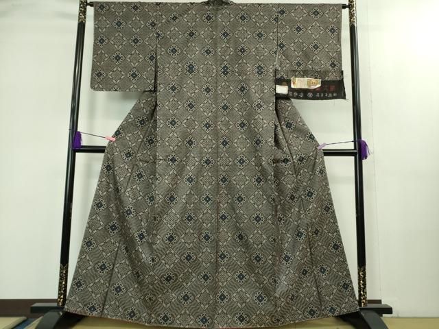 平和屋着物○希少 本場大島紬 龍郷絣 谷崎織物謹製 証紙付き 逸品 未
