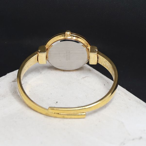 QZ 箱付 チェンジベゼル バングルウォッチ Little Switzerland 白文字